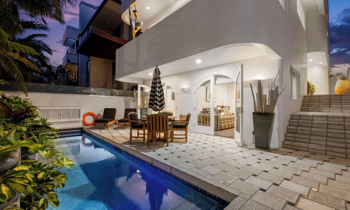 Silver Strand House | Elegant Greco-Roman Inspired Villa with Saltwater Pool & Private Greenbelt: MDR