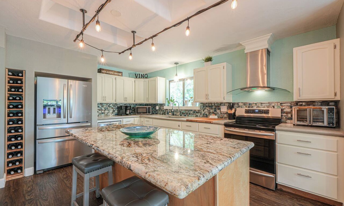 Cornville Cabin | Escape to your own private luxury estate in the heart of Sedona Wine Country. Designed for groups of up to 14 guests, The Reserve offers a rare combination of relaxation, connection, and adventure. Enjoy pickleball matches, evening hot tub gatherings