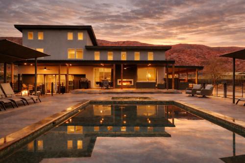 Moab South Valley House | Exclusive Retreats Desert Panorama with Private Pool, Hot Tub, Bocce Court