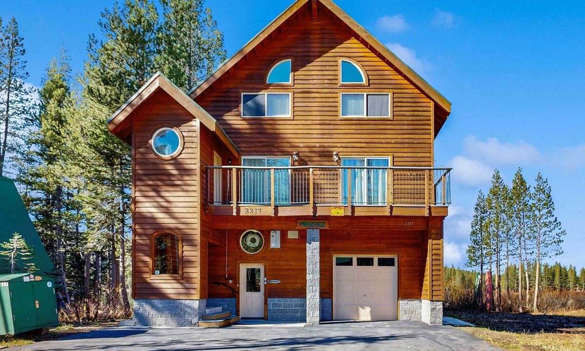 Serene Lakes House | Family-friendly, lakefront getaway with a gas fireplace, furnished deck, & views