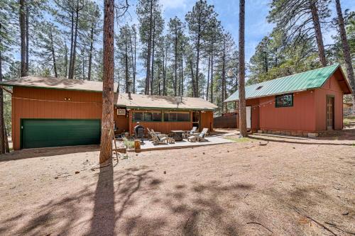 Strawberry House | Forest Views & Fire Pit: Cozy Pine Cabin
