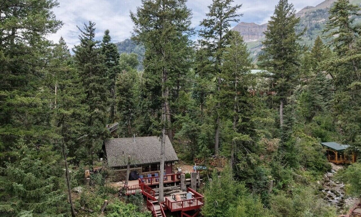 Sundance Cabin | Private mountain escape Above the creek Hot tub Quiet setting Tucked into Sundance Canyon