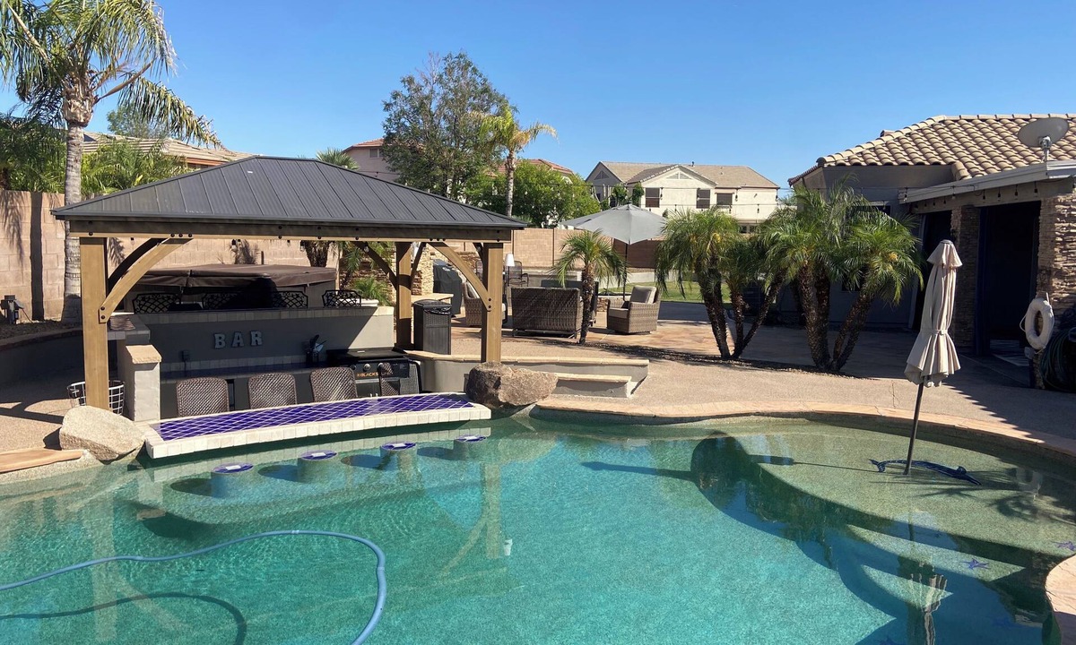 Adobe Highlands House | Summer Vacation Home, Swim up Bar, Water Fall, Outdoor Living, Centrally located