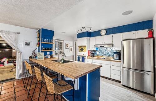 Healy's Dutchtown House | 6 BR! Heated Pool, Hot Tub, Arcade
