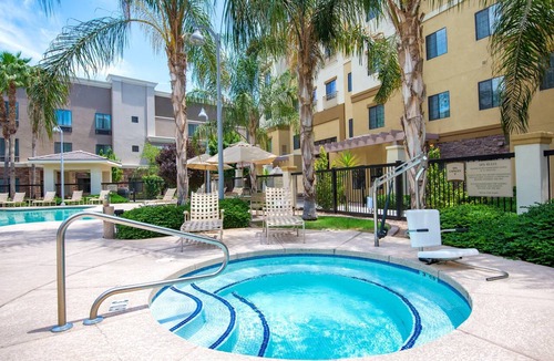 Glendale Sports and Entertainment District Apartment | Accessible 2BR Suite w/Pool + Daily Breakfast