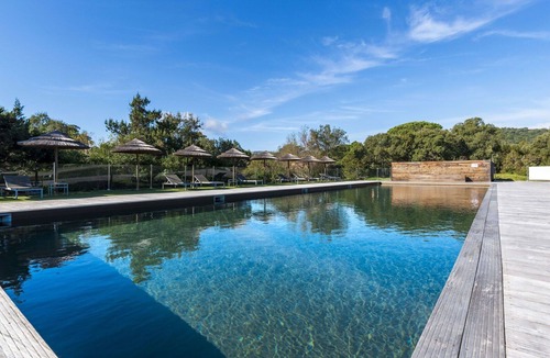 Santa Giulia Apartment | Beautiful apartment for 4 guests with A/C, WIFI, pool, TV and patio