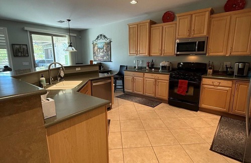 Anthem at Merrill Ranch House | Beautiful home with amazing outdoor kitchen area in 55+ golf community