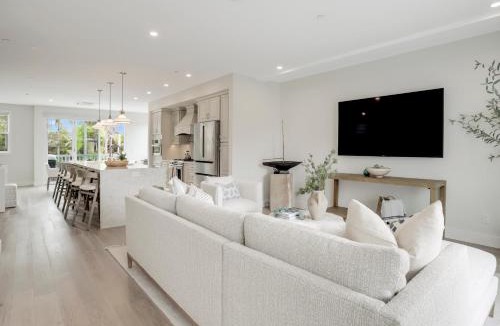 Beach Barber Tract House | Coastal retreat near the beach w Panoramic Ocean Views, Rooftop Deck, & Firepit
