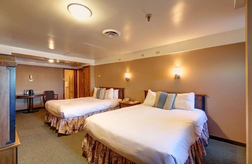 Harbor Hotel | Discover Historic Charm in Our Cozy Ship Stateroom Near Shoreline | 4 Rooms