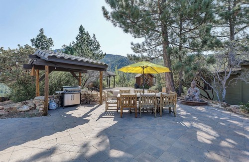 Idyllwild Cabin | Few properties in Idyllwild have a location as majestic and pristine as the Six Acre Sanctuary. Originally a girl scout camp, the land sits atop Idyllwild with beautiful views of Tahquitz Peak on one side and ocean views on the other.