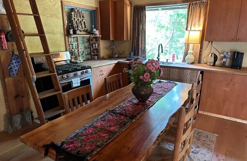 Topanga House | FRENCH 1914 STONE CABIN w/clawfoot bathtub, fireplace + private trails & creek