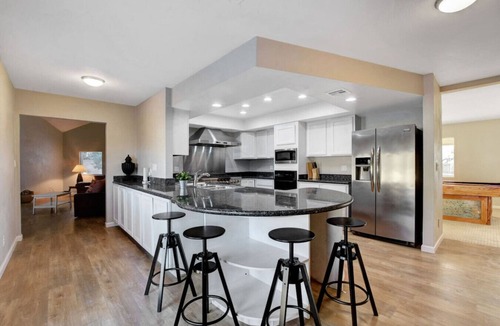 Sunrise Manor House | Gated 6BR Family Home: Pool Table, Fire Pit & Strip Views