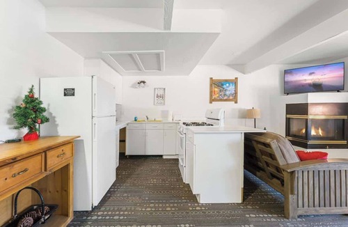 The Village Hotel | Grizzly Bear, Perfect Location in the Village