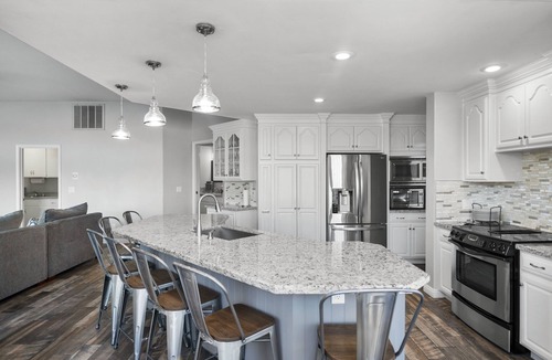 Visalia Villa | Inspired by the iconic white buildings and turquoise waters of Greece.