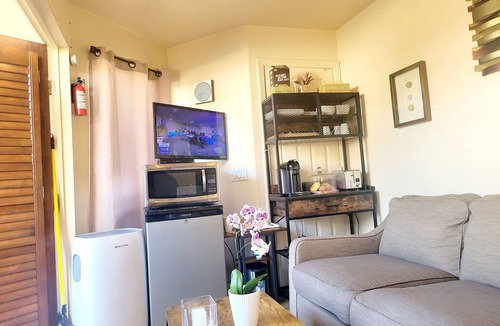 Sunset Beach Apartment | Kayak and paddleboard paradise on an Island 100 yards to Ocean 1st floor Condo
