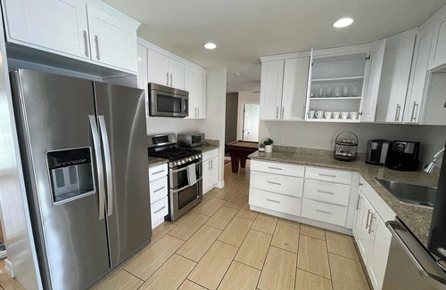 Paradise House | Luxury 5BR/5BA Pool Retreat Near Strip Sleeps 14