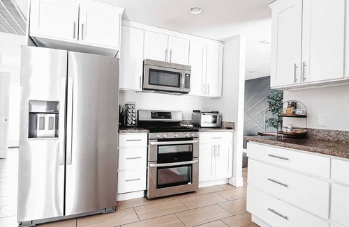 Paradise House | Luxury 5BR/5BA Pool Retreat Near Strip Sleeps 14