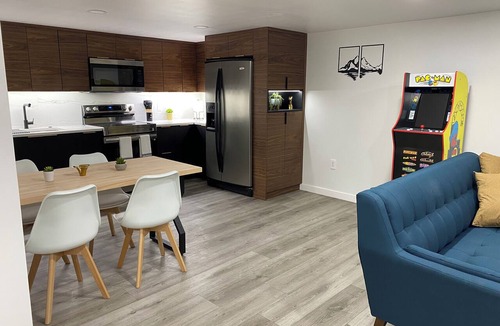 West Valley City Apartment | Luxury basement, escape comfort family friendly & pet friendly w arcade pac-man