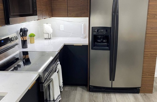 West Valley City Apartment | Luxury basement, escape comfort family friendly & pet friendly w arcade pac-man