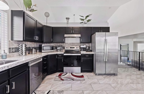West Valley City House | Luxury Family Home with Game Room and Sauna! Conveniently Located!