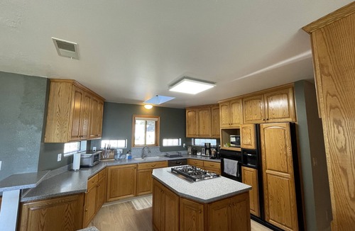 Anchor Bay House | Peaceful Retreat with Ocean Views, Tall Pine Trees, and Beautiful Garden