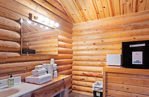 St. Charles Cabin | Rustic camping studio with large front porch & kitchenette