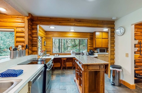 Washougal Cabin | Spacious riverfront lodge with beach access, private hot tub & forest views