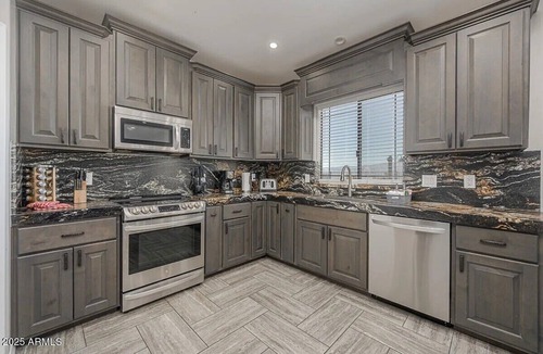 Sunridge Estates House | Sundance Lake Retreat! Spacious 4-bedroom house in serene Bullhead City!