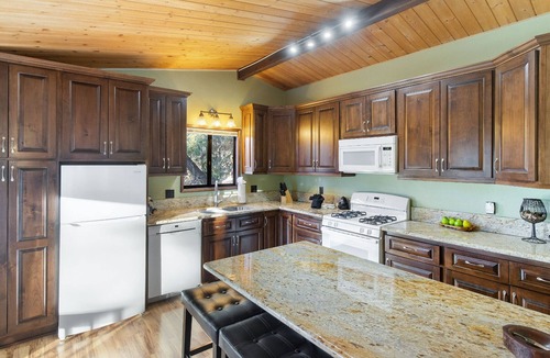 Moonridge Cabin | Sunset Mountain Retreat By Destination Big Bear: Nestled in Lower Moonridge! 1 Mile Away from Bear Mountain Ski Resort, Golf Course and Zoo! Reverse Floor Plan! Air Hockey Game Table!