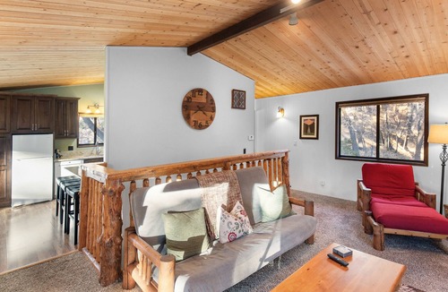 Moonridge Cabin | Sunset Mountain Retreat By Destination Big Bear: Nestled in Lower Moonridge! 1 Mile Away from Bear Mountain Ski Resort, Golf Course and Zoo! Reverse Floor Plan! Air Hockey Game Table!