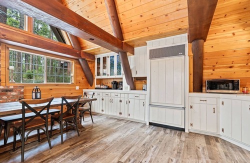 Shaver Lake Cabin | This one-of-a-kind A-frame cabin is full of mountain charm! Short walk to all of the shops, restaurants, and the lake!