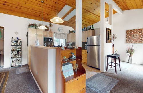 Three Rivers House | Yard & Patio: Quiet & Well-Stocked Riverside Home