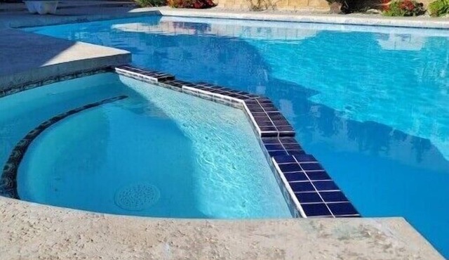 2 bedroom 1 bath private home with a Pooln