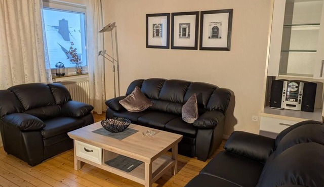 Bright apartment (81 m²) with a wood-burning stove and a balcony with a view in Hallenberg