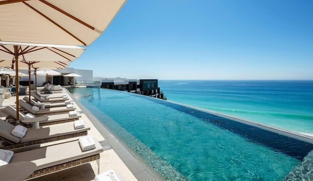 Cabo Luxury on the beach with 2 bedrooms, full kitchen, 2 balconies and hammocks in Cabo San Lucas