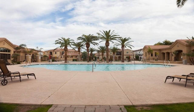 Gated townhouse with 2 suites, heated pool and spa