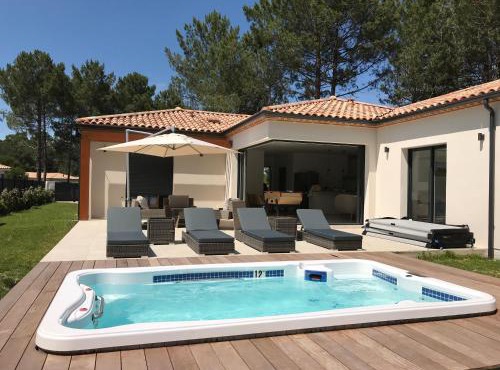 Location villa entre lac et océan avec son spa de nage in Carcans