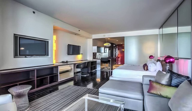 Luxurious Strip View Condo with Private Balcony
