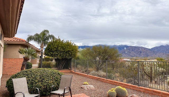 Mountain-view home with on-site pool/hot tub, private yard, patio