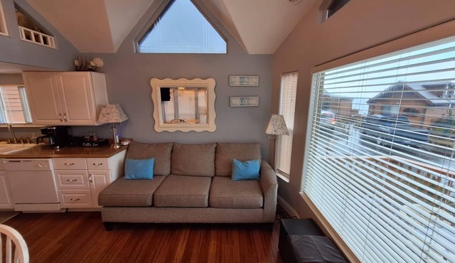 Ocean Cabin 23 is a cozy seaside bungalow with loft, limited ocean views, and private beach. in Smith River