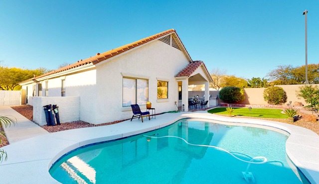 Power Ranch home with private pool, outdoor areas & a park across the street in Gilbert
