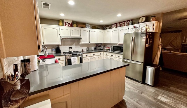 Relax in Exeter at a 2 bedroom 1 bath Oasis with a large covered patio and Pool