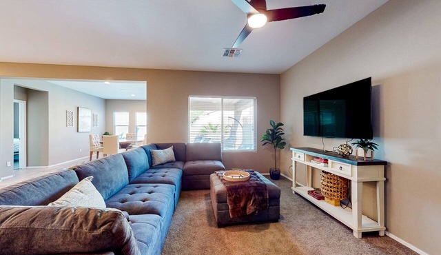 Single-story home with enclosed yard, private pool, hot tub, patio, & grill