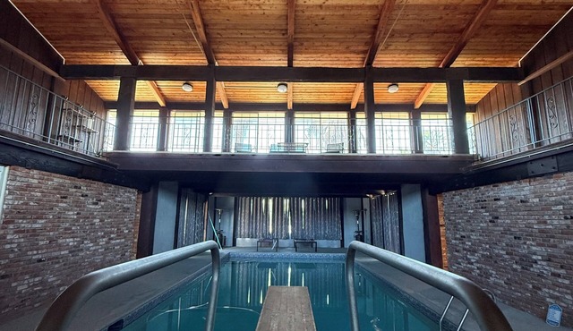 Stylish 60s home with INDOOR POOL on 2 acres
