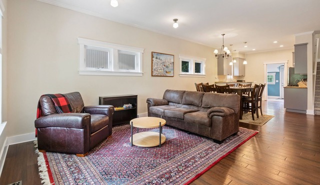Two-story, dog-friendly home with a fenced yard, patio & washer/dryer in Spokane