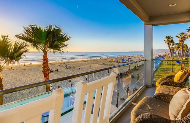 Unbeatable beachfront condo with modern kitchen, balcony & unparalleled sunsets