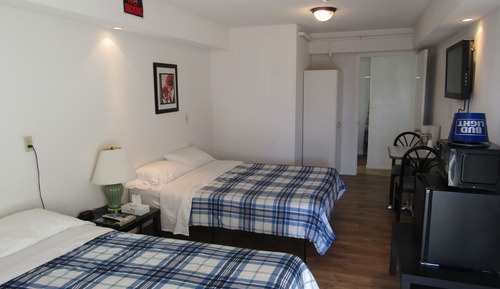 Deluxe Room One Queen Bed & One Single Bed