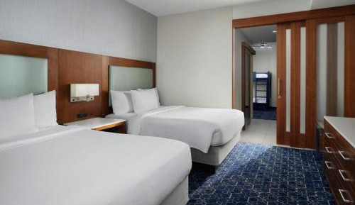 One-Bedroom Queen Suite with Two Queen Beds, Bunk Beds and Sofa Bed