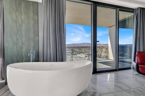 1 Bedroom Balcony Collection Living Room & Jet Tub Bath - StripSuite Palms Place Hotel, Resort & Casino - NO RESORT FEE