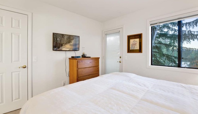 Modern 2BR/2.5BA Resort Condo: Attached Garage, Pond Views & Steps to Resort